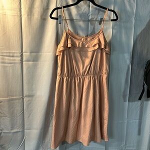 Spaghetti strap taupe color dress.